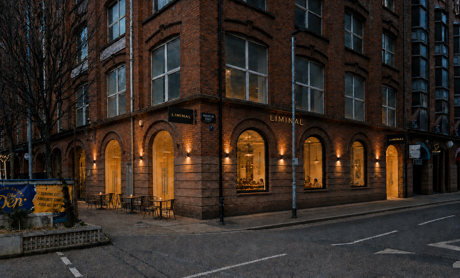 Indicative visualisation of Liminal's Franklin Street exterior with warm lighting and pavement bistro seating